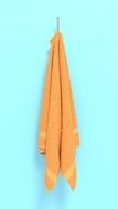 orange towel hanging on a hook in the pool