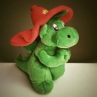 green dinosaur as a child's toy