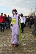 young lady in cosplay costume