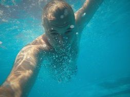 swimmer under water close-up