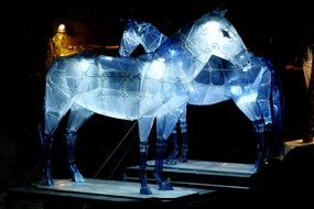 glowing lantern in the form of a horse at night