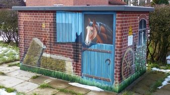 painted horse in a stable