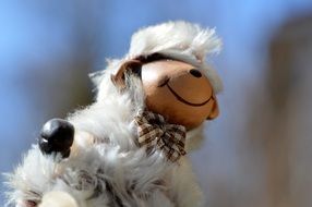 sheep soft toy with raised leg