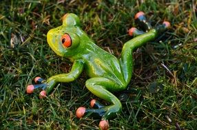 figure of a green exotic frog