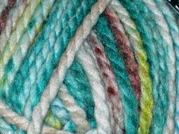 a ball of colorful thread for knitting