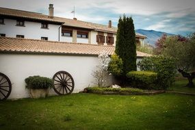 beautiful villa in summer garden at mountains