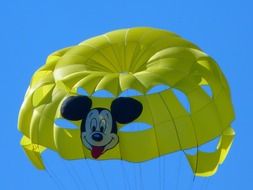 yellow parachute with a mickey mouse