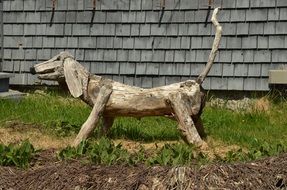wooden sculpture of a dachshund