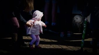 child among people