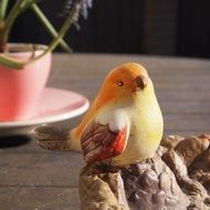 ceramic bird on the table