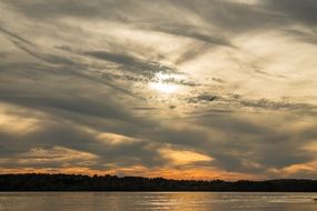 birds over the lake at sunset