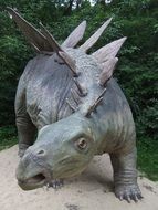 figure of dinosaur in the park