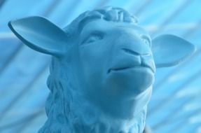 blue sheep statue on the roof background