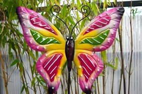 bright colorful butterfly as a decoration of the park