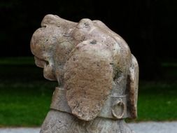 stone statue of a dig