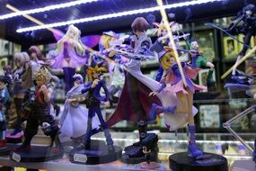 collection of figures in the style of anime