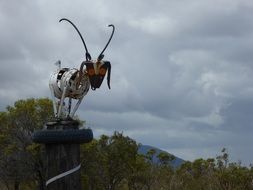 sculpture of goat from scrap metal in nature