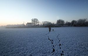 Promenade on the snow on beautiful and colorful landscape