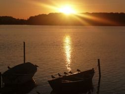 Sunshine on the boats and lake On the Sunset