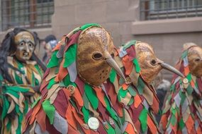 group of people in carnival costumes