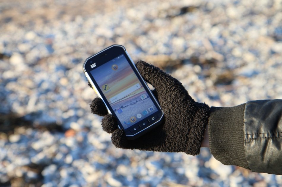 included smartphone in human hand