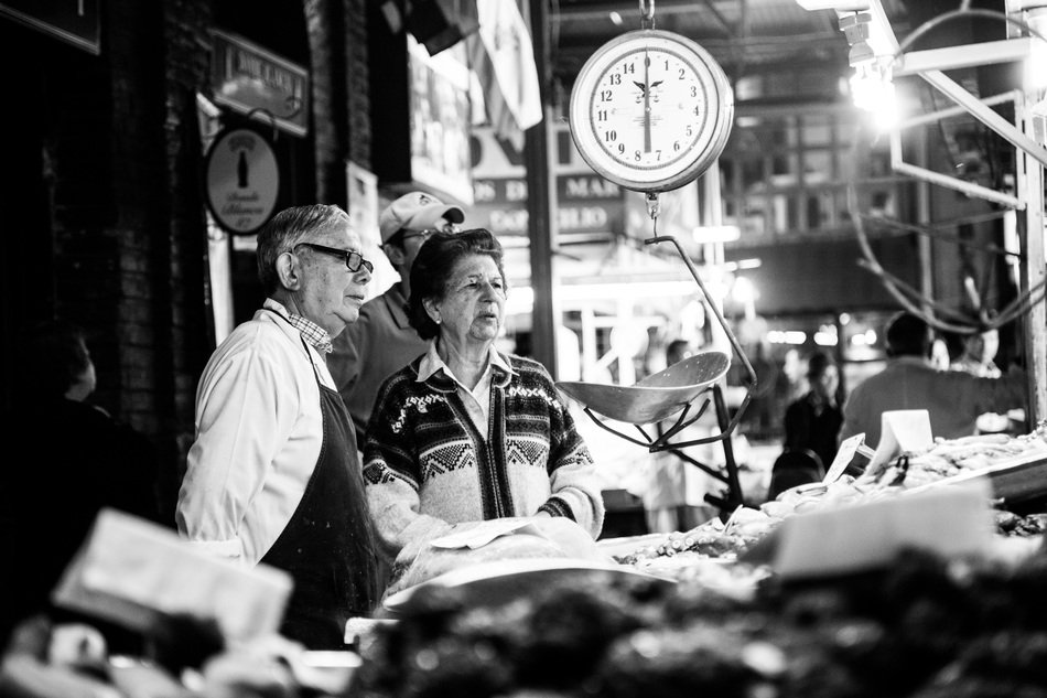 man and woman at the fish market