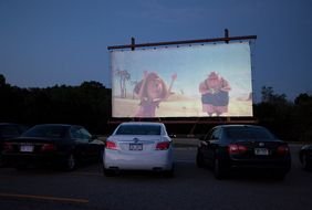 outdoor movie screen in the evening