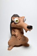 ceramic figurine of a squirrel on a white background