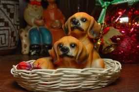 Statue of puppies in a basket