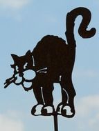 drawing of a black cat on a pole