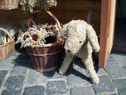 straw dog near the basket