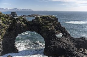 stone arch by the sea