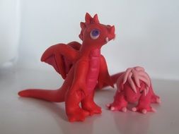 red plasticine dinosaurs