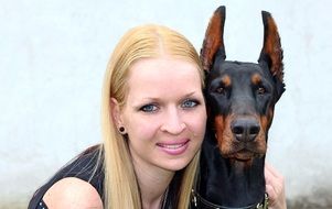 Woman with the Doberman
