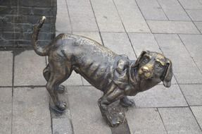 bronze Dog, sculpture on pavement