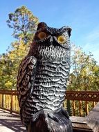 wood sculpture of an owl