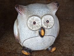 clay sculpture in the shape of an owl