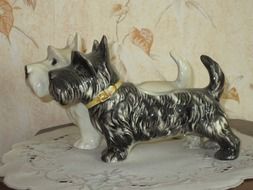 two ceramic figures of a dog