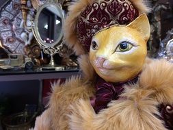 sculpture of a cat in a suit