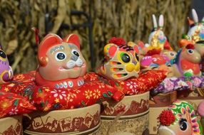 ceramic toys in the form of cats