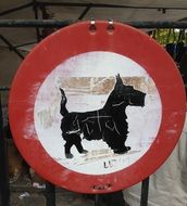 road sign with a dog