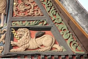 Lion decor on the wooden truss