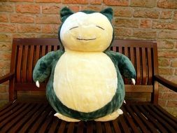 soft toy on bench, pokemon