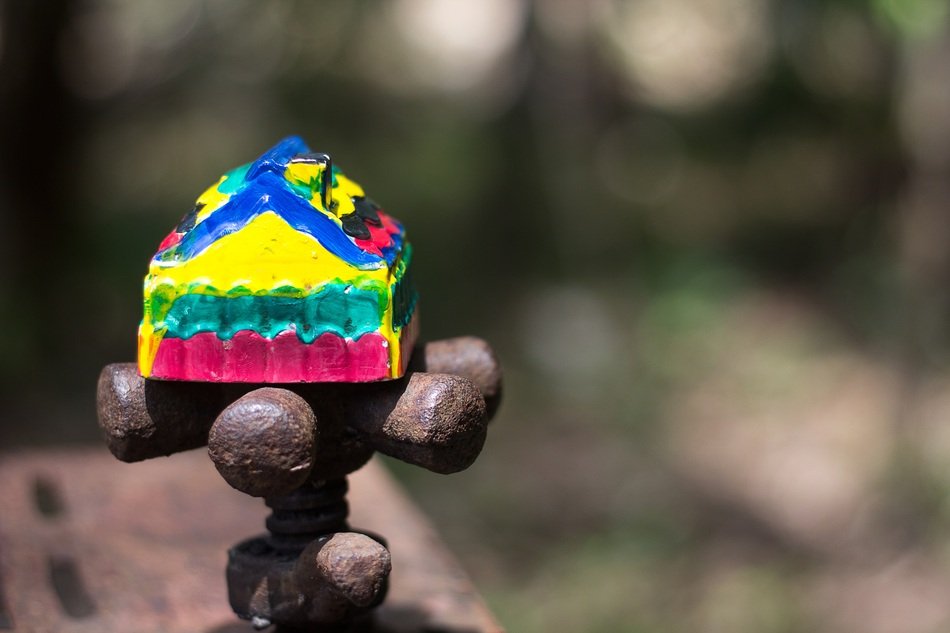 small colored house for rodent at blurred background