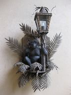 Monkey holding Lamp, wall decoration