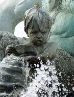 statue of a child in a fountain in Berlin