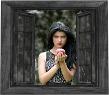 girl with an apple by the window