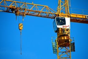 construction crane against a clear blue sky