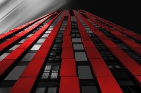 black building with red stripes in holland, bottom view