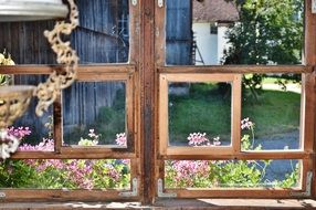 rustic view from a wooden window